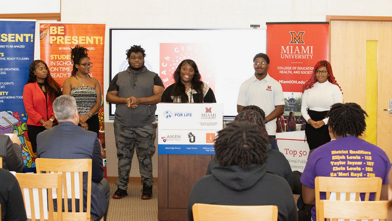 Teri’Ana Joyner (speaking) and other TEACh program members take in a press conference announcing the expansion of the program. (Photo courtesy of Miami University) 