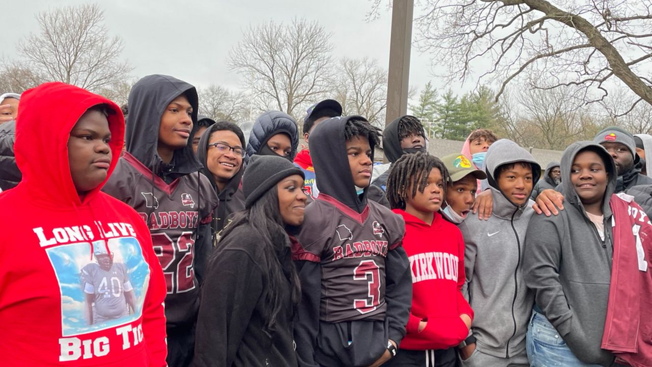 St. Louis community members braved the wintry mix Thursday at Forest Wood Park to honor 14-year-old Tyre Sampson who died last week in Florida. 