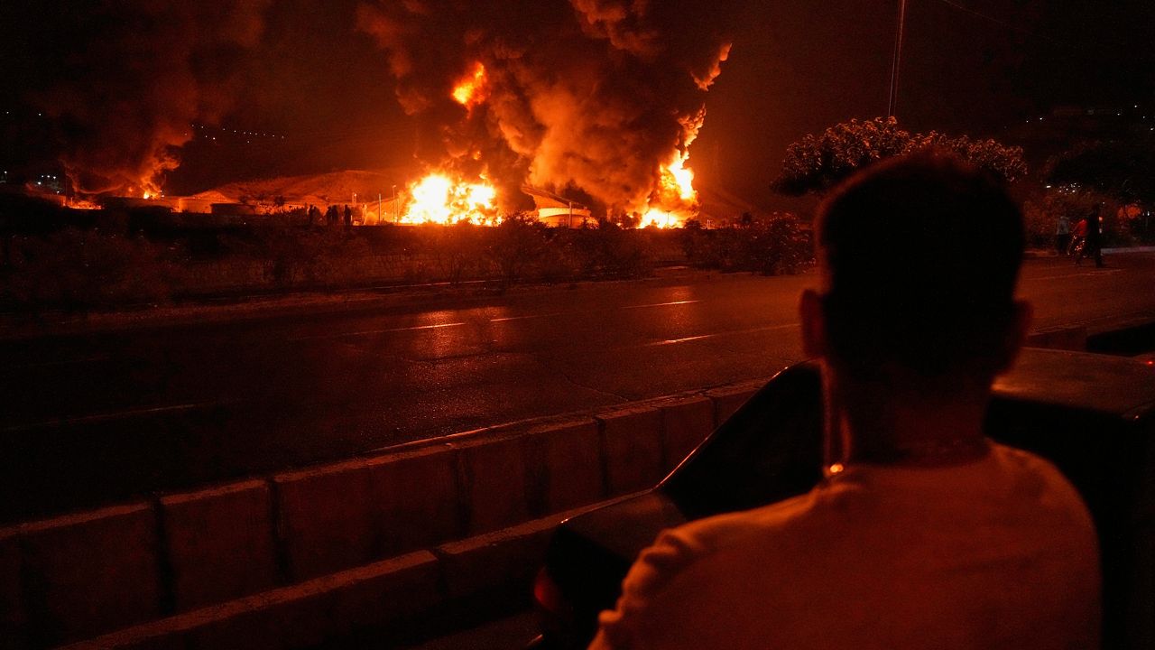 Smoke rises up after an explosion in Tehran, Iran, Friday, June 13, 2025. (AP Photo/Vahid Salemi)