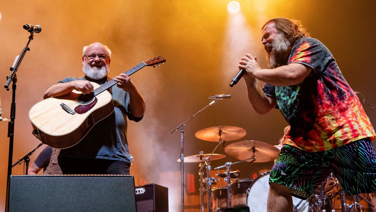 Kyle Gass, left, and Jack Black of Tenacious D perform at the Louder Than Life Music Festival in Louisville, Kentucky on Sept. 22, 2022. (Photo by Amy Harris/Invision/AP)