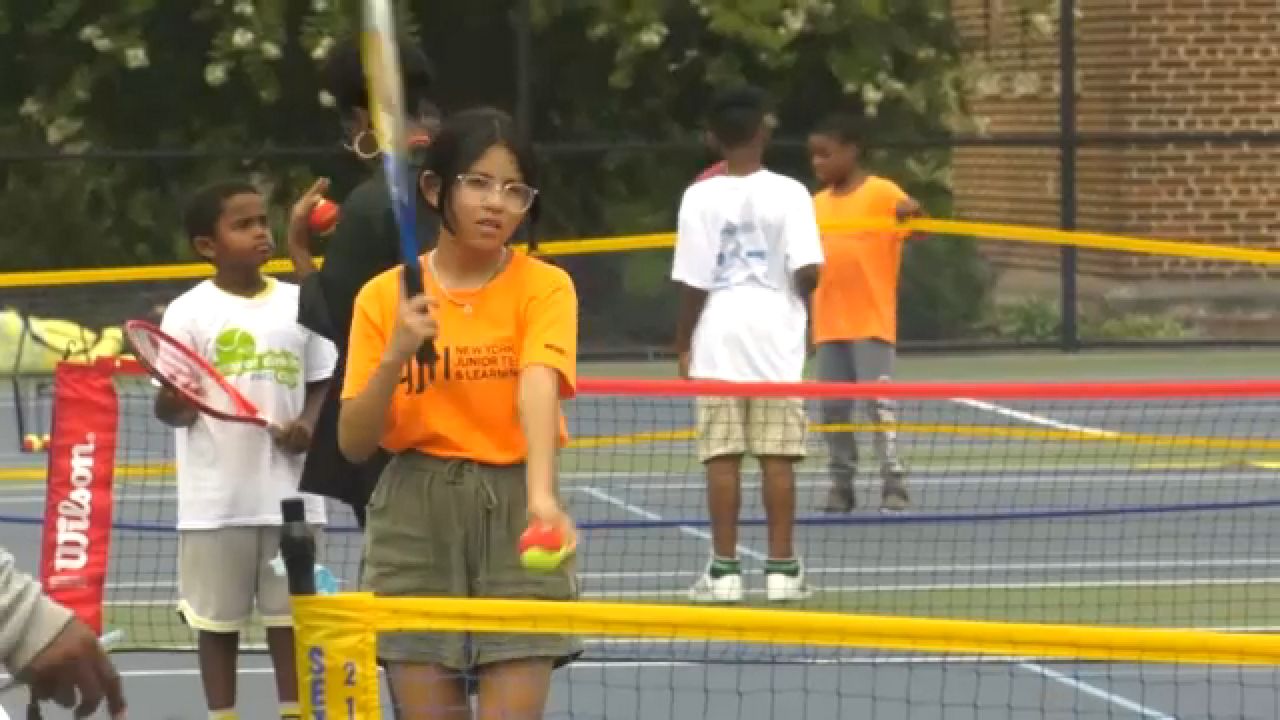 Young Tennis Players Showcase Skills at Crotona Park Tournament
