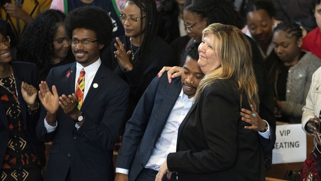 Expelled Rep. Justin Pearson, D-Memphis, from left, expelled Rep. Justin Jones, D-Nashville, and Rep. Gloria Johnson, D-Knoxville, are recognized by the audience at Fisk University before Vice President Kamala Harris arrives, Friday, April 7, 2023, in Nashville, Tenn. (AP Photo/George Walker IV)