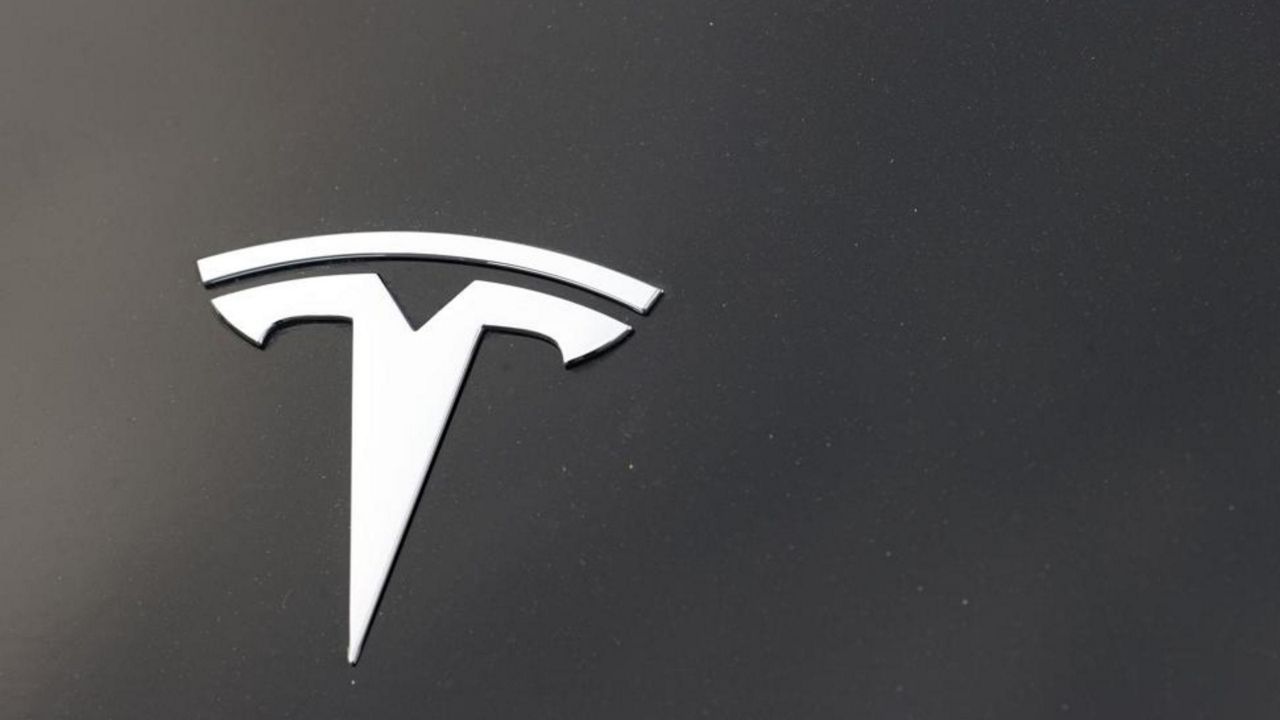 Tesla logo. (AP)