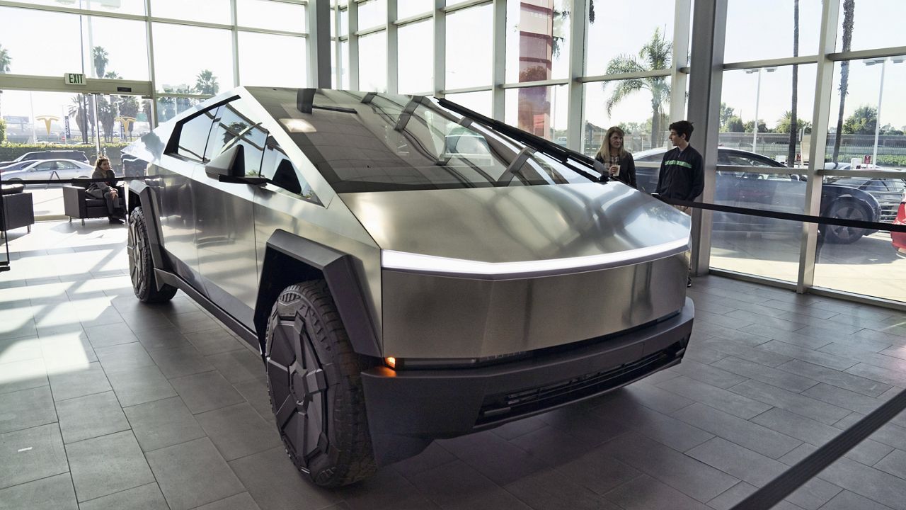  A Tesla Cybertruck is on display at the Tesla showroom in Buena Park, Calif., Dec. 3, 2023. (AP Photo/Richard Vogel, File)