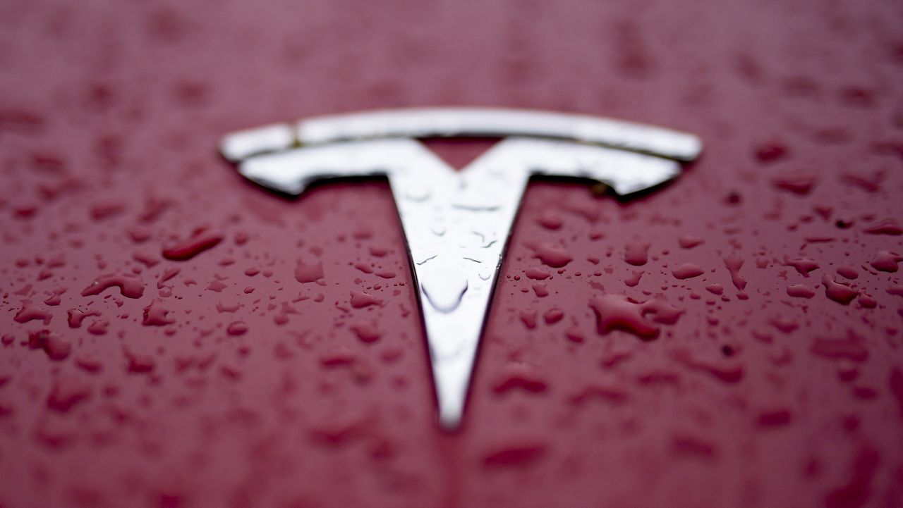 A Tesla logo is shown on Feb. 27, 2024, in Charlotte, N.C. (AP Photo/Chris Carlson, File)