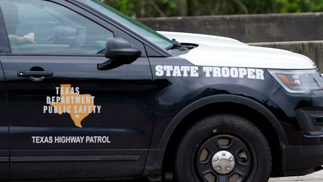 A Texas Department of Public Safety patrol vehicle appears in Orange, Texas, in this image from March 30, 2020. (AP Photo/David J. Phillip)