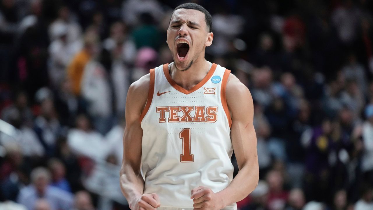 Texas' Dylan Disu celebrates during the final seconds of the second half of a second-round college basketball game in the NCAA Tournament Saturday, March 18, 2023, in Des Moines, Iowa. (AP Photo/Morry Gash)