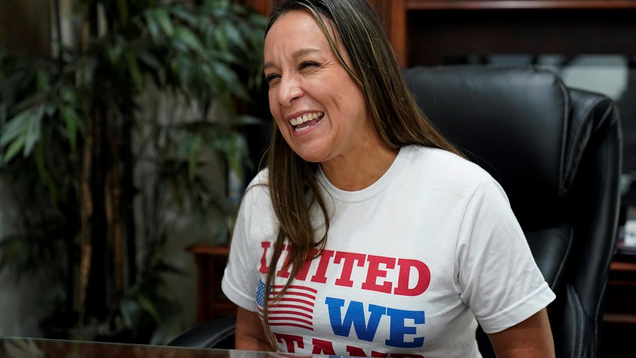 Republican Monica De La Cruz-Hernandez talks in her office in Alamo, Texas, (AP Photo/Eric Gay)