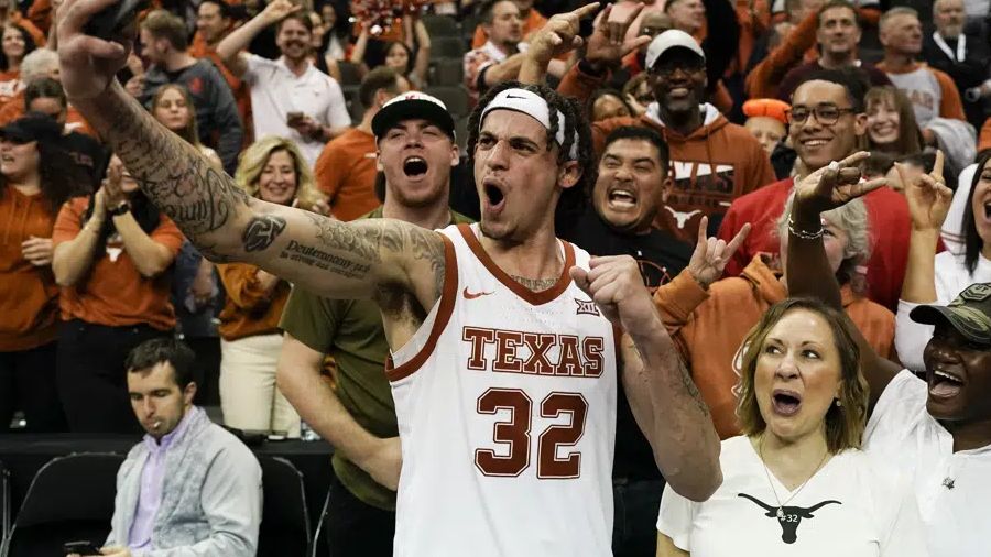 Texas forward Christian Bishop celebrates after their win against Xavier in a Sweet 16 college basketball game in the Midwest Regional of the NCAA Tournament Friday, March 24, 2023, in Kansas City, Mo. (AP Photo/Charlie Riedel)