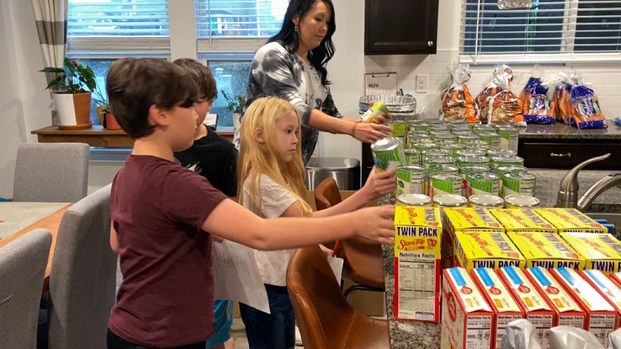 Volunteers getting food for 100K people for Thanksgiving 