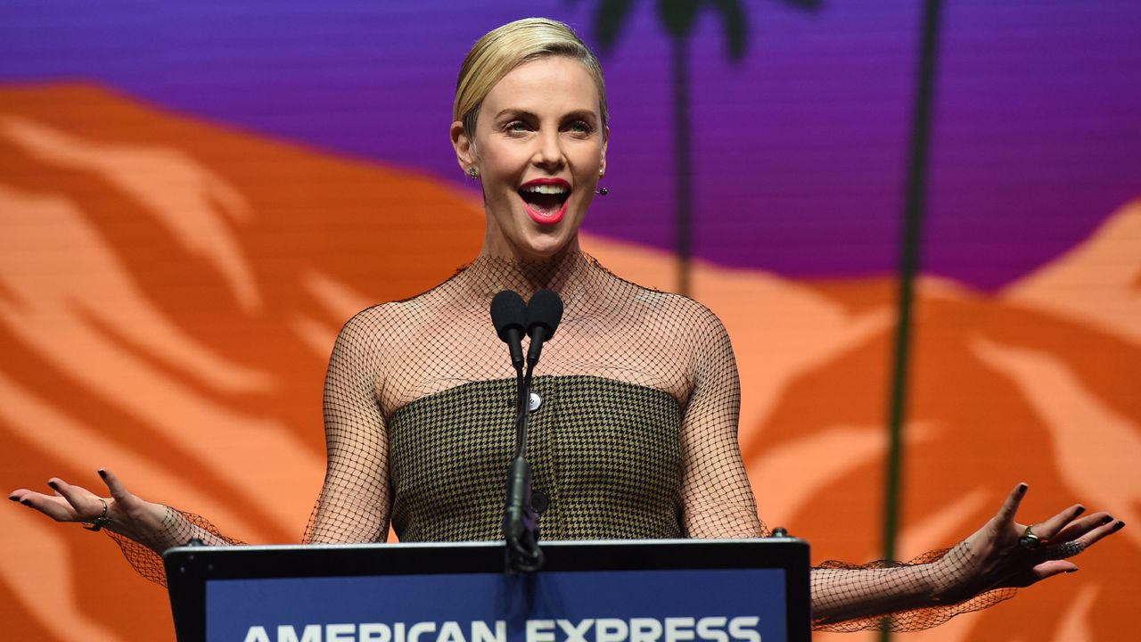 Charlize Theron accepts the international star actress award for her role in "Bombshell" at the 31st annual Palm Springs International Film Festival Awards Gala on Thursday, Jan. 2, 2020, in Palm Springs, Calif. (AP Photo/Chris Pizzello)