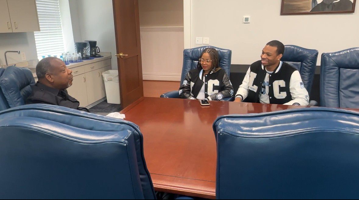 Livingstone College president Anthony Davis speaks to students Genice Smith and Benjamin Courtney. Davis, lovingly called 