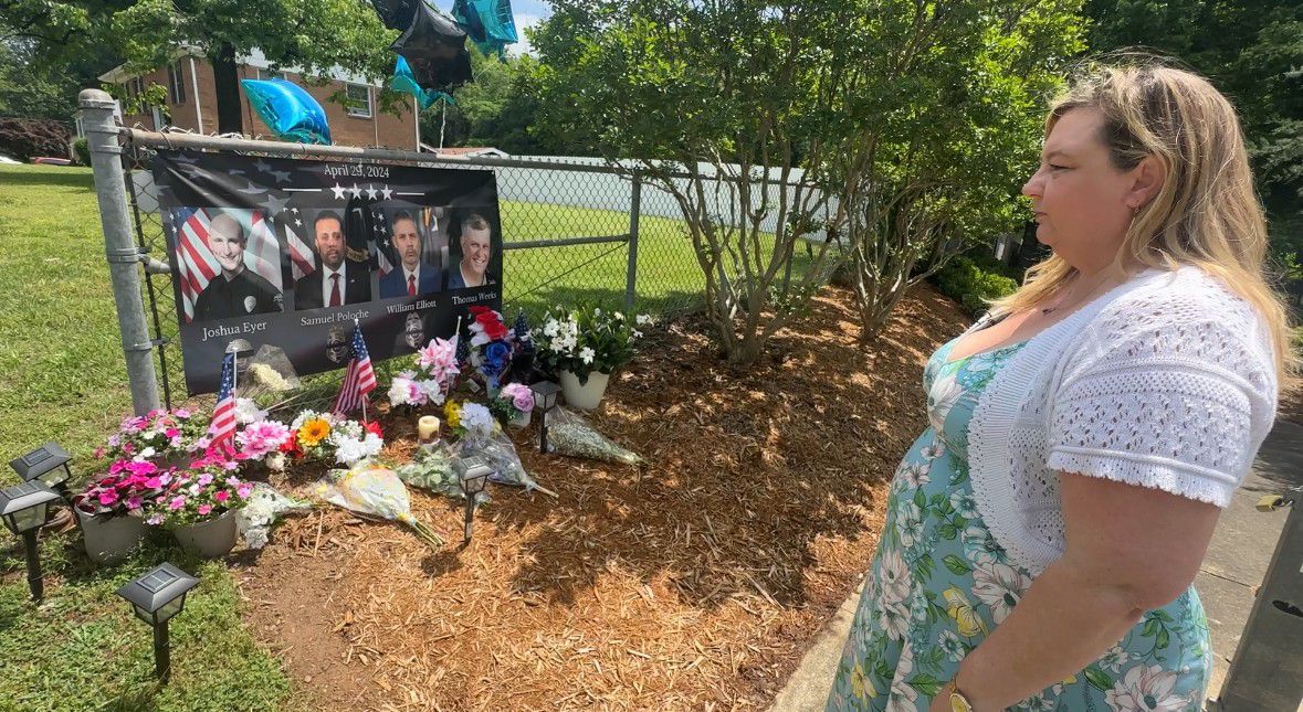 Neighbors paying respects to fallen officers