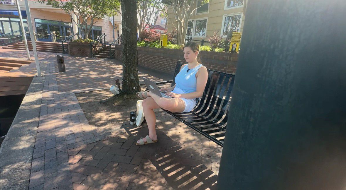 Grace Fendrick checks an online petition she launched against a partnership proposal for renovation of Bank of America Stadium in Charlotte. (Spectrum News 1/Jennifer Roberts)