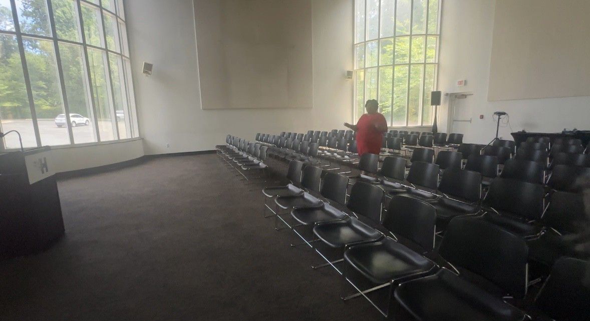 Terri White, president and CEO of the Charlotte Museum of History, stands in the space where immigrants will take the oath of allegiance to be U.S. citizens on Independence Day. (Spectrum News 1/Jennifer Roberts)