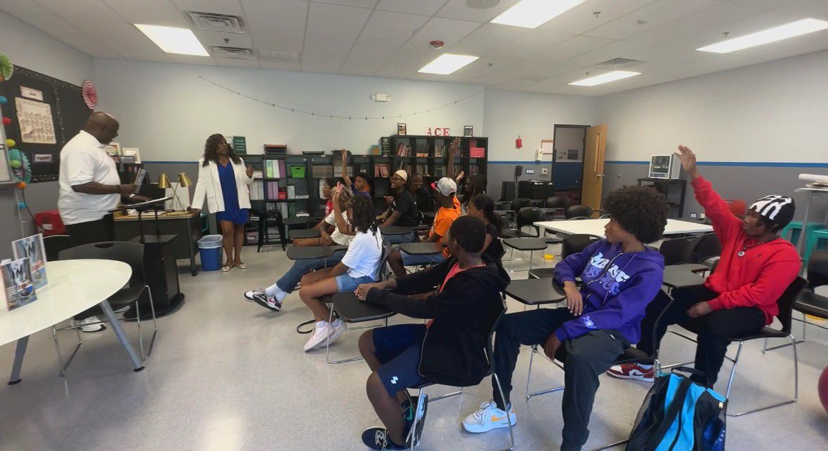 A.C.E. Academy cofounders Shawn Smalls and Laila Minott are talking with students about the power of entrepreneurship (Spectrum News 1/Jennifer Roberts) 