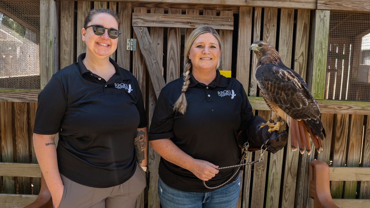 Brigid Kunzler (left) and Tiffany Dicks (right) are both volunteers at Raptor Rehabilitation of Kentucky (Spectrum News 1/Mason Brighton)