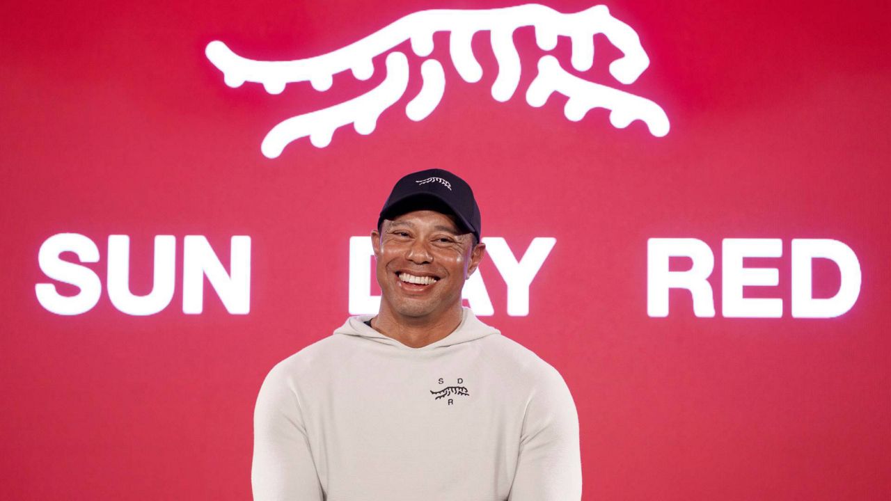 Tiger Woods reacts at a news conference ahead of the Genesis Open golf tournament on Monday in the Pacific Palisades area of Los Angeles. (AP Photo/Eric Thayer)