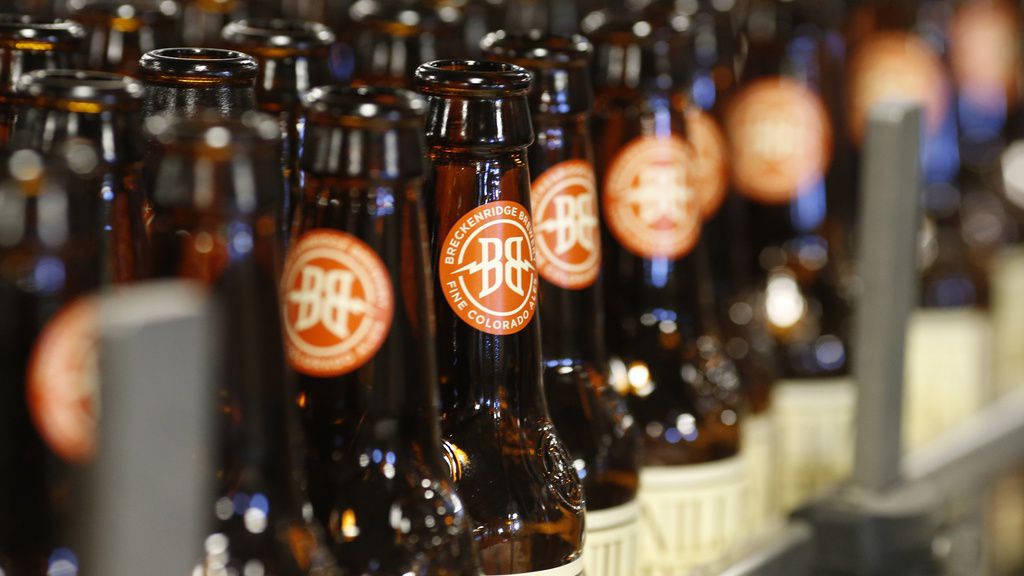 Empty bottles head down the line to be washed in the factory of Breckenridge Brewery in Littleton, Colo., on Thursday, Jan. 21, 2016. The cannabis company Tilray expanded its position in the craft brew industry with the acquisition of eight beer and beverage brands from Anheuser-Busch, including Breckenridge Brewery. Tilray said that the transaction, which was announced in August 2023, will triple its beer sales volume from four million cases to 12 million. (AP Photo/David Zalubowski, File)