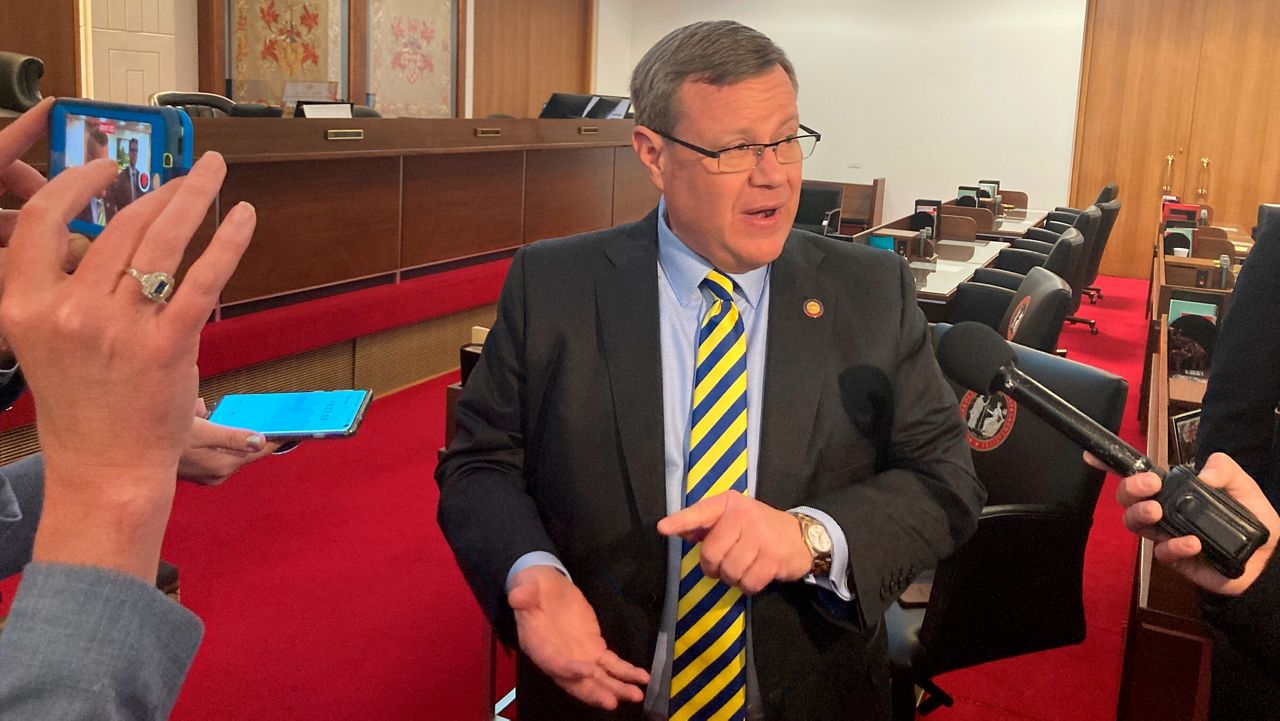N.C. House Speaker Tim Moore, R-Cleveland, speaks to reporters on the House floor at the Legislative Building in Raleigh, N.C., on Thursday, March 10, 2022. The legislature prepared to adjourn officially on Friday, 14 months after a work session began. (AP Photo/Gary D. Robertson)