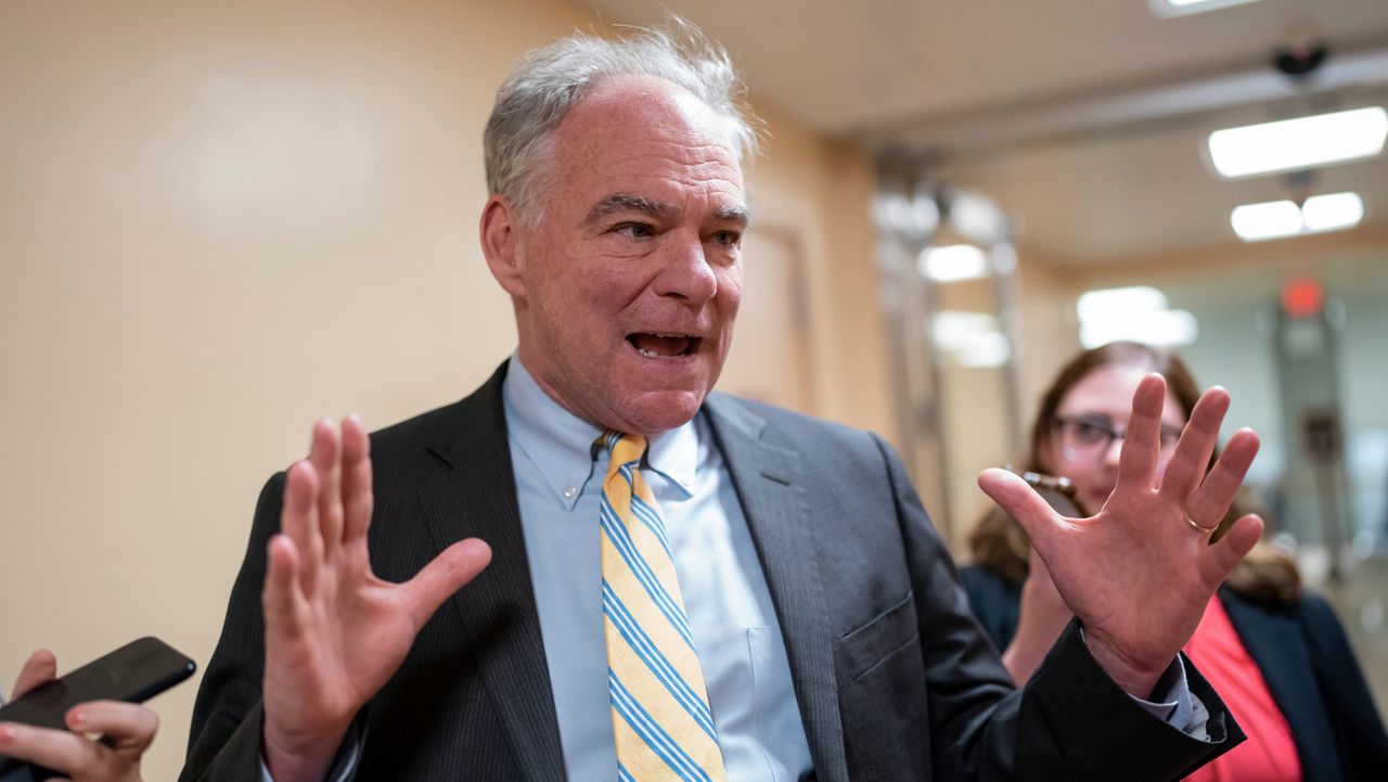 Sen. Tim Kaine, D-Va., speaks to reporters on his way to a vote as lawmakers react to a mass shooting at a Texas elementary school, at the Capitol in Washington, Wednesday, May 25, 2022. (AP Photo/J. Scott Applewhite)