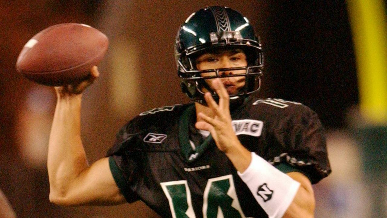 Timmy Chang set NCAA records for passing yardage, completions, attempts and interceptions in a playing career from 2000 to 2004. He is the new UH head coach, his first such job. 
