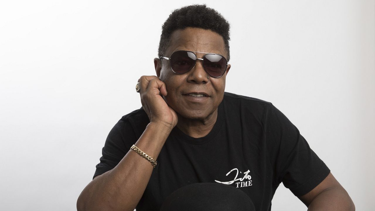 Tito Jackson, a member of the famed Jackson 5, poses for a portrait in Los Angeles, July 24, 2019, to promote his solo project, a new version of his 2017 song "One Way Street." (Photo by Mark Von Holden/Invision/AP, File)