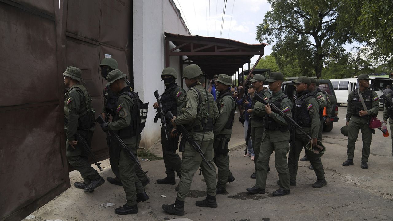 Soldiers raid the Tocorón Penitentiary Center, in Tocorón, Venezuela, Sept. 20, 2023. The Tren de Aragua gang originated at the prison. (AP Photo/Ariana Cubillos, File)