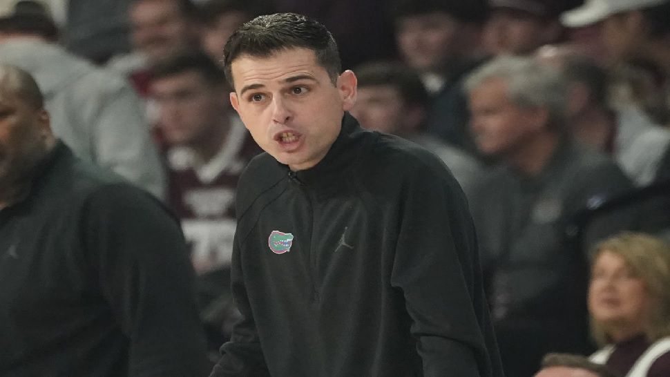 Florida head coach Todd Golden reacts to a play during the first half of an NCAA college basketball game against Mississippi State, Wednesday, Feb. 11, 2025, in Starkville, Miss. (AP Photo/Rogelio V. Solis)