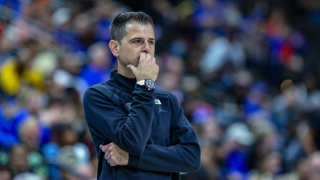 Florida men's basketball coach Todd Golden watches play during the Gators' game against USF on Nov. 4, 2024. (AP Photo/Gary McCullough)