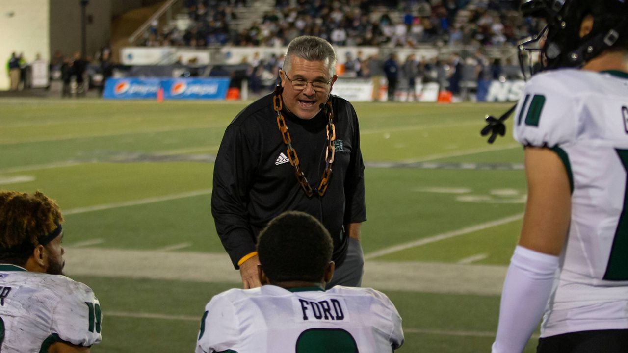 Hawaii football coach Todd Graham, seen here Oct. 16 at Nevada, has come under fire after the defections of multiple prominent players from the Rainbow Warriors program.