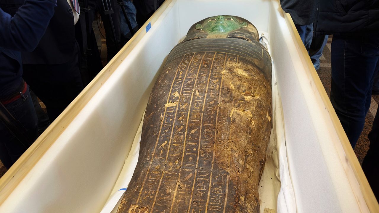 An ancient wooden sarcophagus is displayed during a handover ceremony at the foreign ministry in Cairo, Egypt on Monday, Jan. 2, 2023.