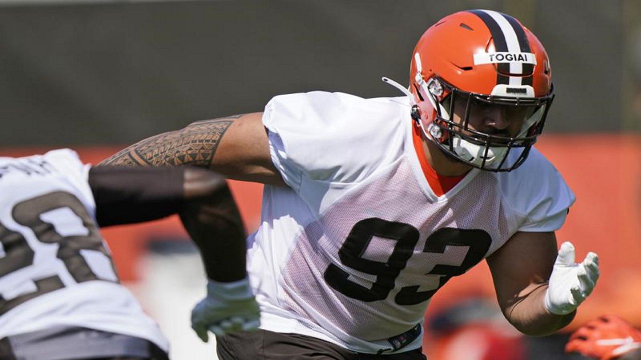 Cleveland Browns cornerback Greg Newsome II watches during a drill