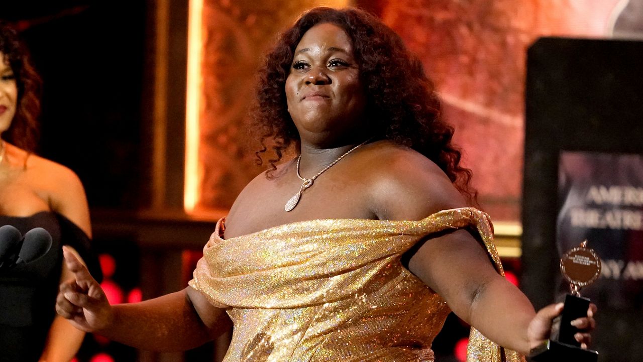 Alex Newell accepts the award for best performance by an actor in a featured role in a musical for "Shucked" at the 76th annual Tony Awards on Sunday, June 11, 2023, at the United Palace theater in New York. (Photo by Charles Sykes/Invision/AP)