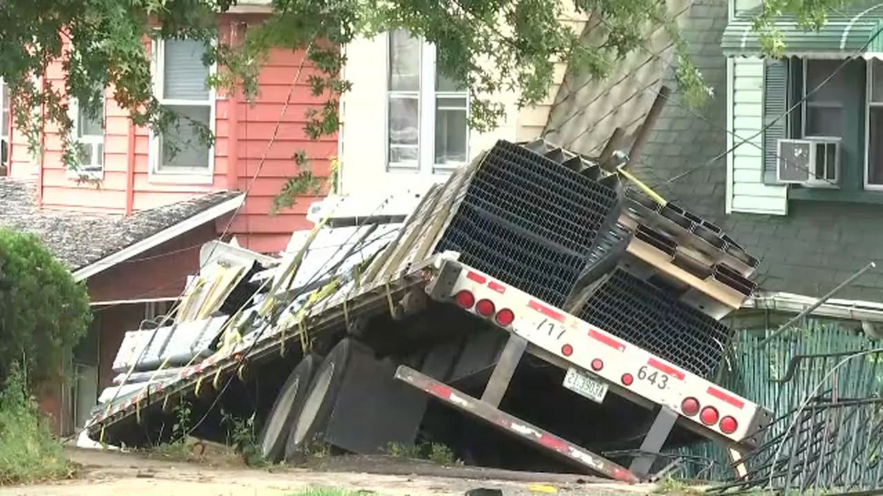 Tractor trailer crashes into three homes