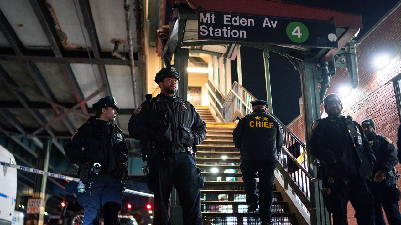 Police officers stand guard following a shooting on Monday, Feb. 12, 2024 in the Bronx.