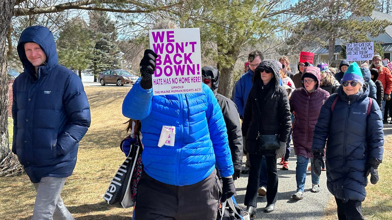 In this file photo from 2025, people march in Cumberland to show their support for transgender students. (Spectrum News file photo)