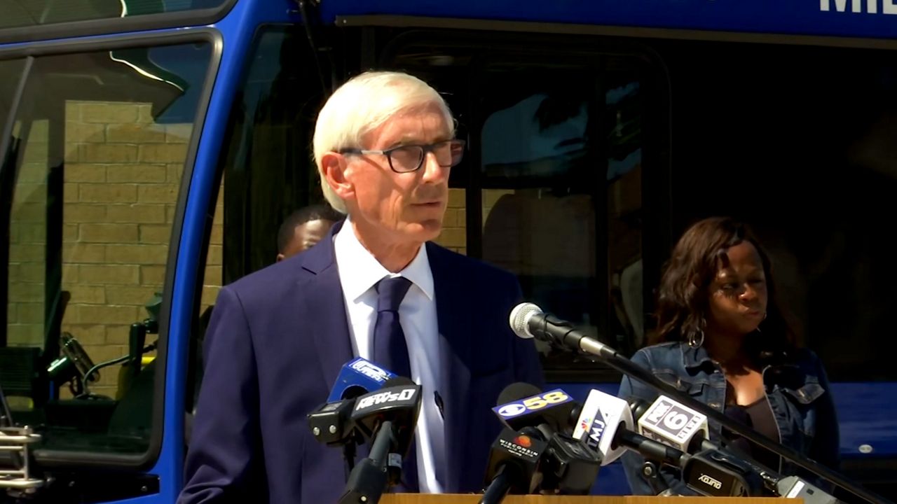 Gov. Tony Evers announces $25M investment in transit services during a press conference in Milwaukee, Wis.