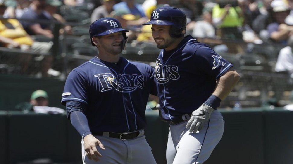 Tampa Bay first baseman Travis d'Arnaud drove in three runs and hit a two-run homer in Sunday's game against Oakland.
