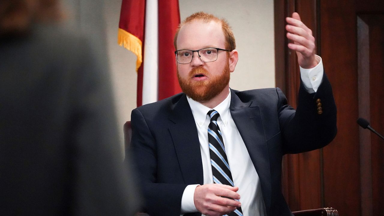 Defendant Travis McMichael testifies during his trial for the killing of Ahmaud Arbery at the Glynn County Courthouse on Thursday, Nov. 18, 2021 in Brunswick, Ga. (Sean Rayford/Pool Photo via AP)