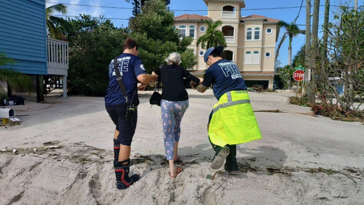 Treasure Island Fire Rescue officials helping residents get to safety in Hurricane Helene's aftermath. (Photo Courtesy: City of Treasure Island)