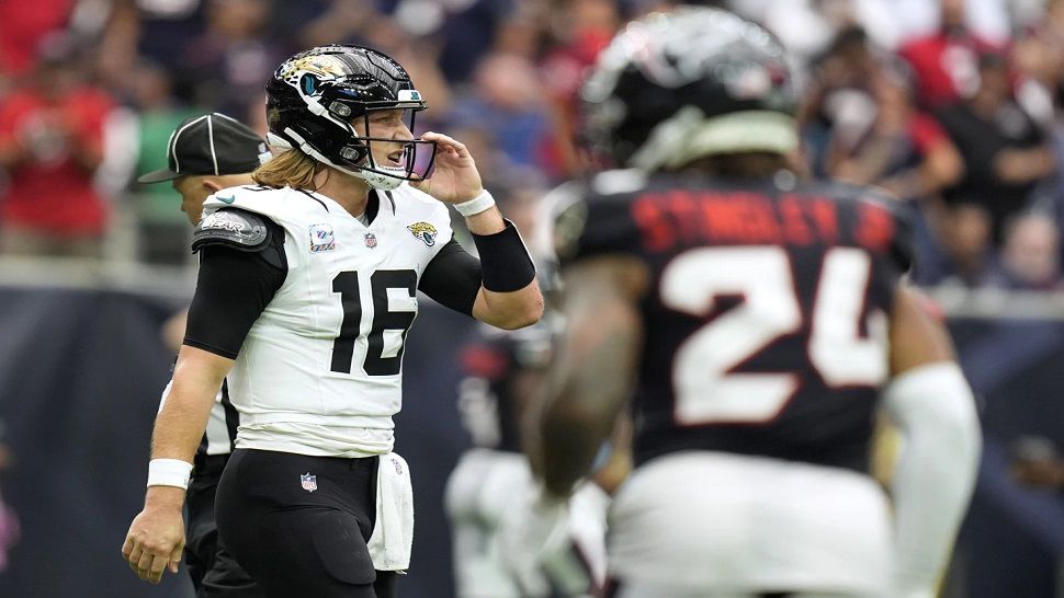 Jacksonville Jaguars quarterback Trevor Lawrence (16) reacts after being stopped on a fourth down play during the second half of an NFL football game against the Houston Texans, Sunday, Sept. 29, 2024, in Houston. (AP Photo/Eric Gay)