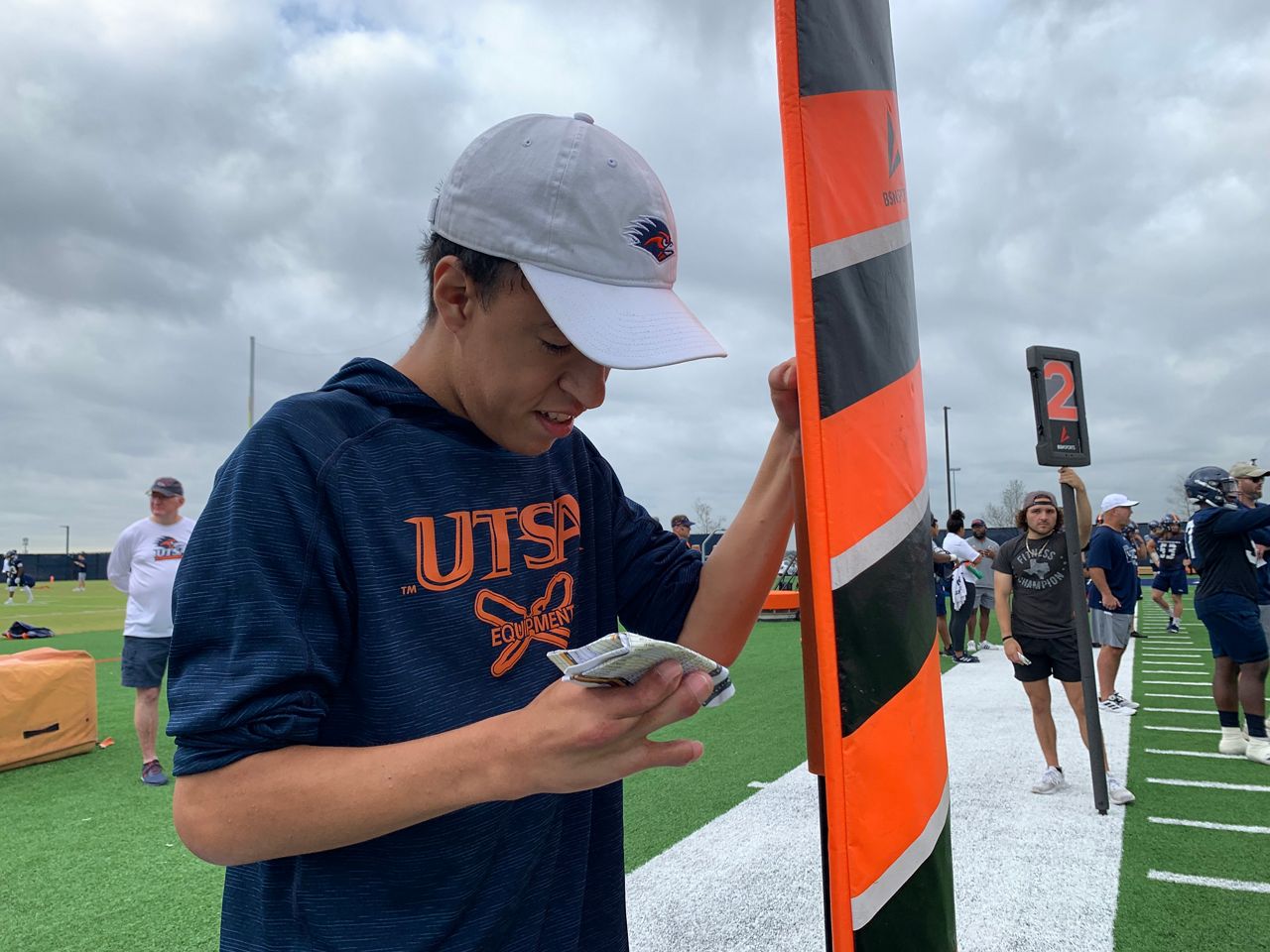 Tripp Trinidad, a member of the UTSA equipment team, appears in this image from October 2021. (Spectrum News 1/Adam Rossow)