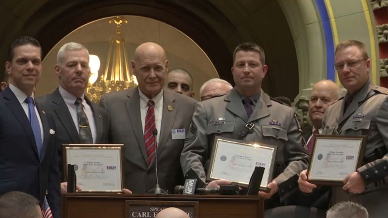 troopers holding awards 