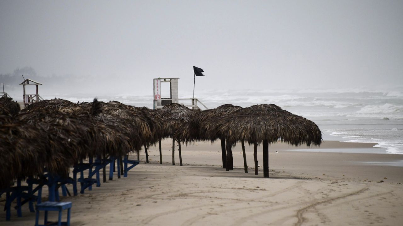 Palapas sit deserted on a beach in Miramar, in the southwestern Gulf of Mexico, Wednesday, June 19, 2024. Tropical Storm Alberto formed on Wednesday in the southwestern Gulf of Mexico, the first named storm of the hurricane season. (AP Photo/Fabian Melendez)