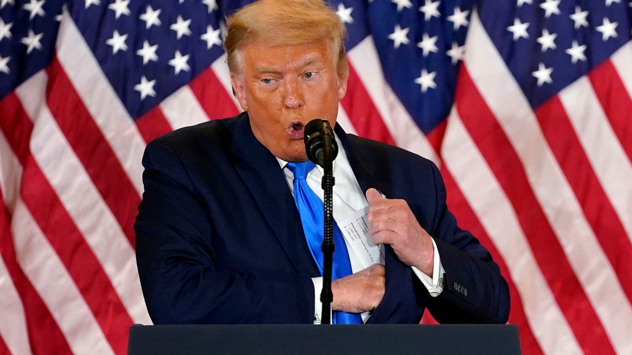 President Donald Trump speaks in the East Room of the White House, early Wednesday, Nov. 4, 2020, in Washington. (AP Photo/Evan Vucci)