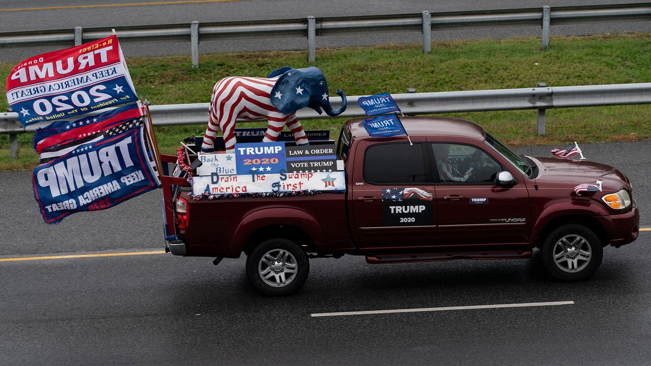 Supporters of President Donald Trump with decorated vehicles, caravan on the I-495 Capital Beltway, Sunday, Nov. 1, 2020, In Fort Washington, Md. (AP Photo/Alex Brandon)