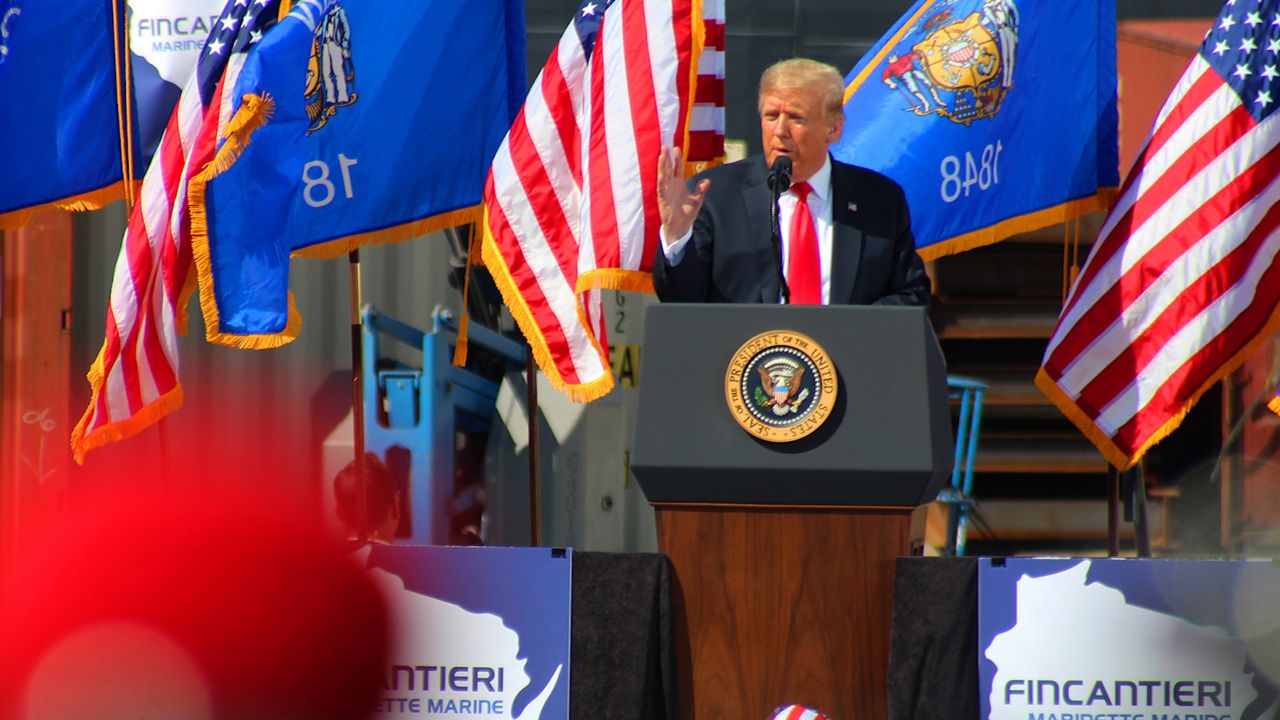 President Trump addresses Fincantieri Marinette Marine employees in shipyard.