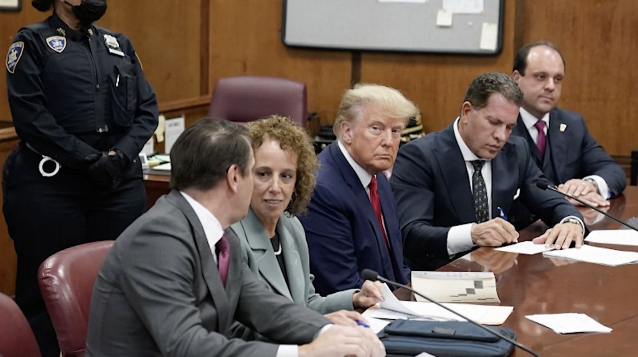 Former President Donald Trump sits at the defense table with his legal team in a Manhattan court on April 4 in New York. (AP Photo/Seth Wenig, Pool)