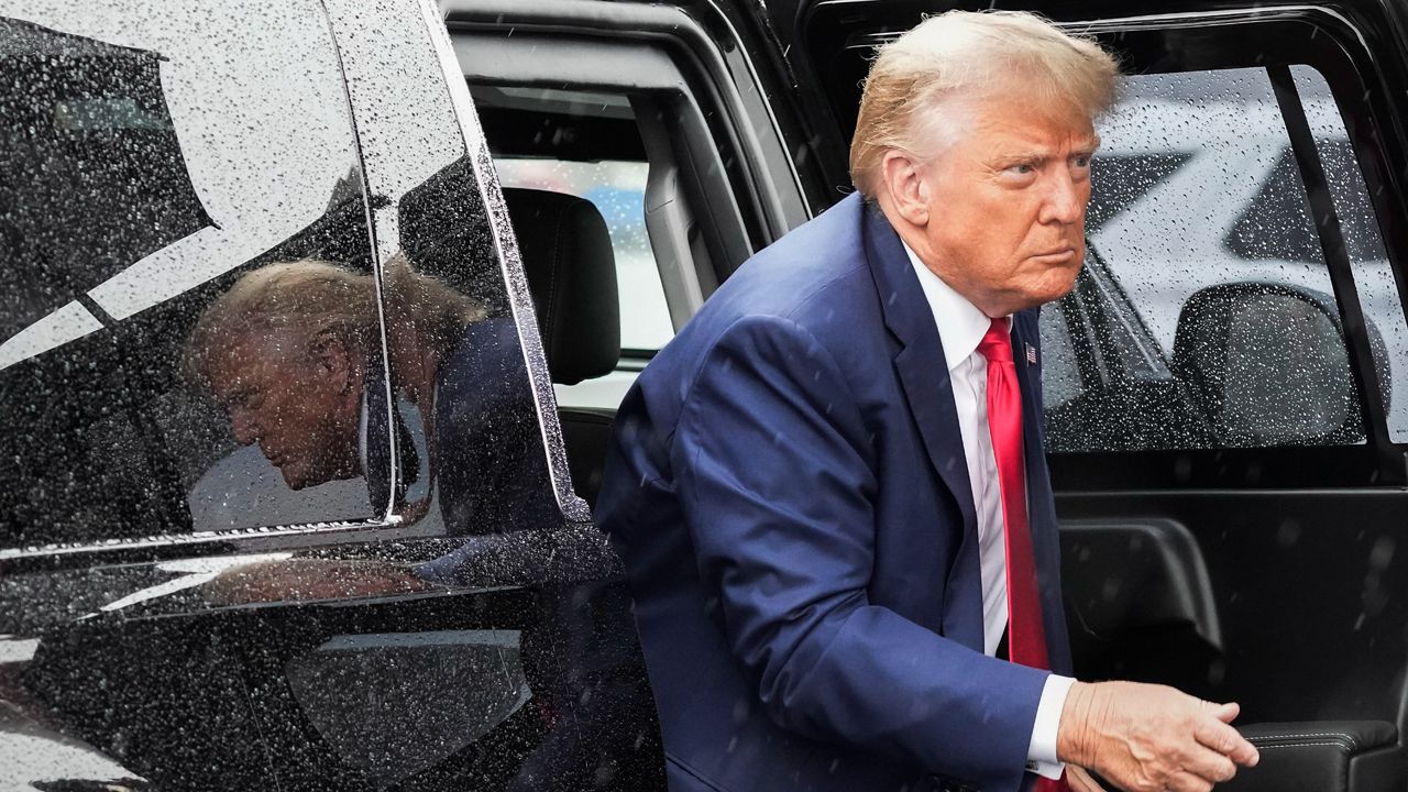 Former President Donald Trump arrives to board his plane at Ronald Reagan Washington National Airport, Aug. 3, 2023, in Arlington, Va., after facing a judge on federal conspiracy charges that allege he conspired to subvert the 2020 election. (AP Photo/Alex Brandon)